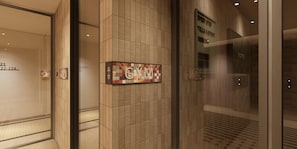 A hallway with a sign for 'GYNA' and a mirrored wall reflecting a sign for 'Brewery Step Tells a Story'. - Motto By Hilton Shanghai Wuliqiao (Shanghai)