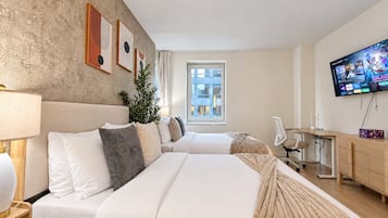 Deluxe Suite, Multiple Beds, Non Smoking, Private Bathroom | Blackout drapes, iron/ironing board, WiFi (free), individually decorated