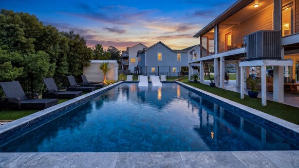 Outdoor pool, a heated pool - 4BR Heated Pool Gym EV Charger 5 Min Walk to Beach (Surf City)