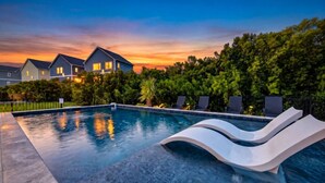 Outdoor pool, a heated pool - 4BR Heated Pool Gym EV Charger 5 Min Walk to Beach (Surf City)