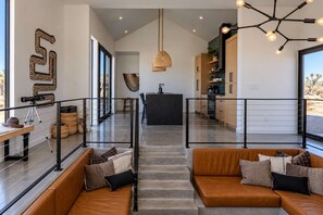 Steps from the conversation pit to the kitchen - Moasis · Pool, Hot Tub, Conversation Pit, Hammocks (Yucca Valley)