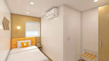 A bedroom with a bed, a wardrobe, a radiator, and a window.