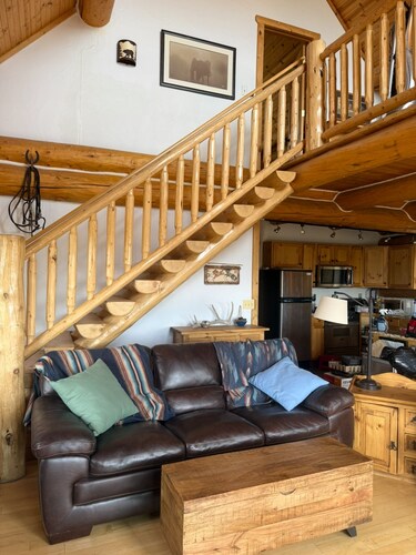 Gorgeous Log Home on 20 acres. Three bedrooms, two baths, sleeps six.
