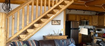 Gorgeous Log Home on 20 acres. Three bedrooms, two baths, sleeps six.