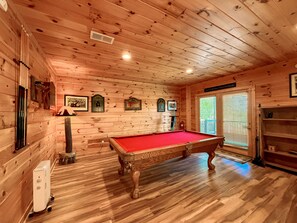 A wooden interior with a pool table, a billiards rack, and a fireplace. - Mountain View Cabin Near Downtown Blue Ridge (Blue Ridge)