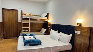 Habitació quàdruple Deluxe | Wifi gratuïta 