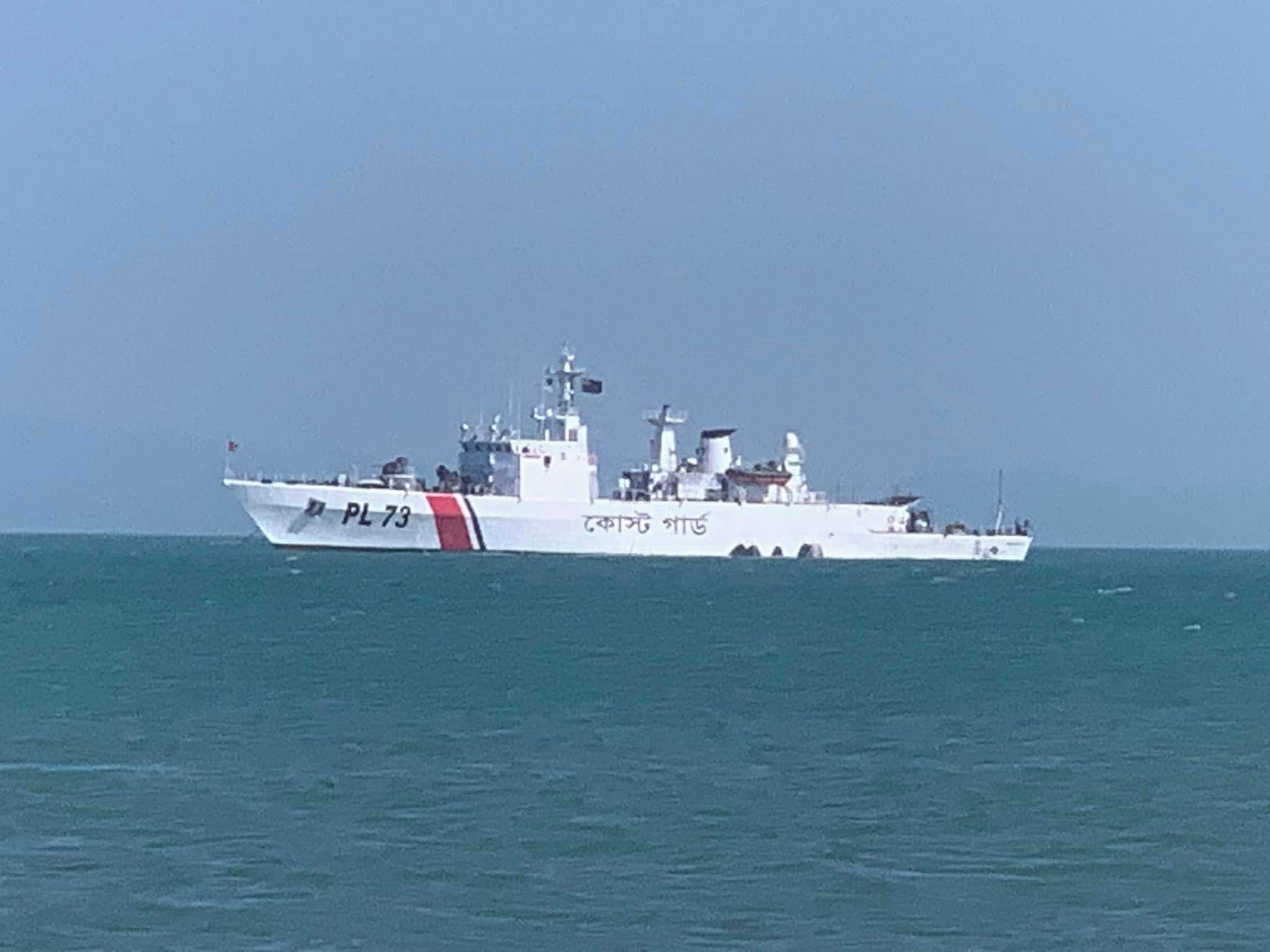 A large naval ship with the hull number PL 73, sailing on open water.