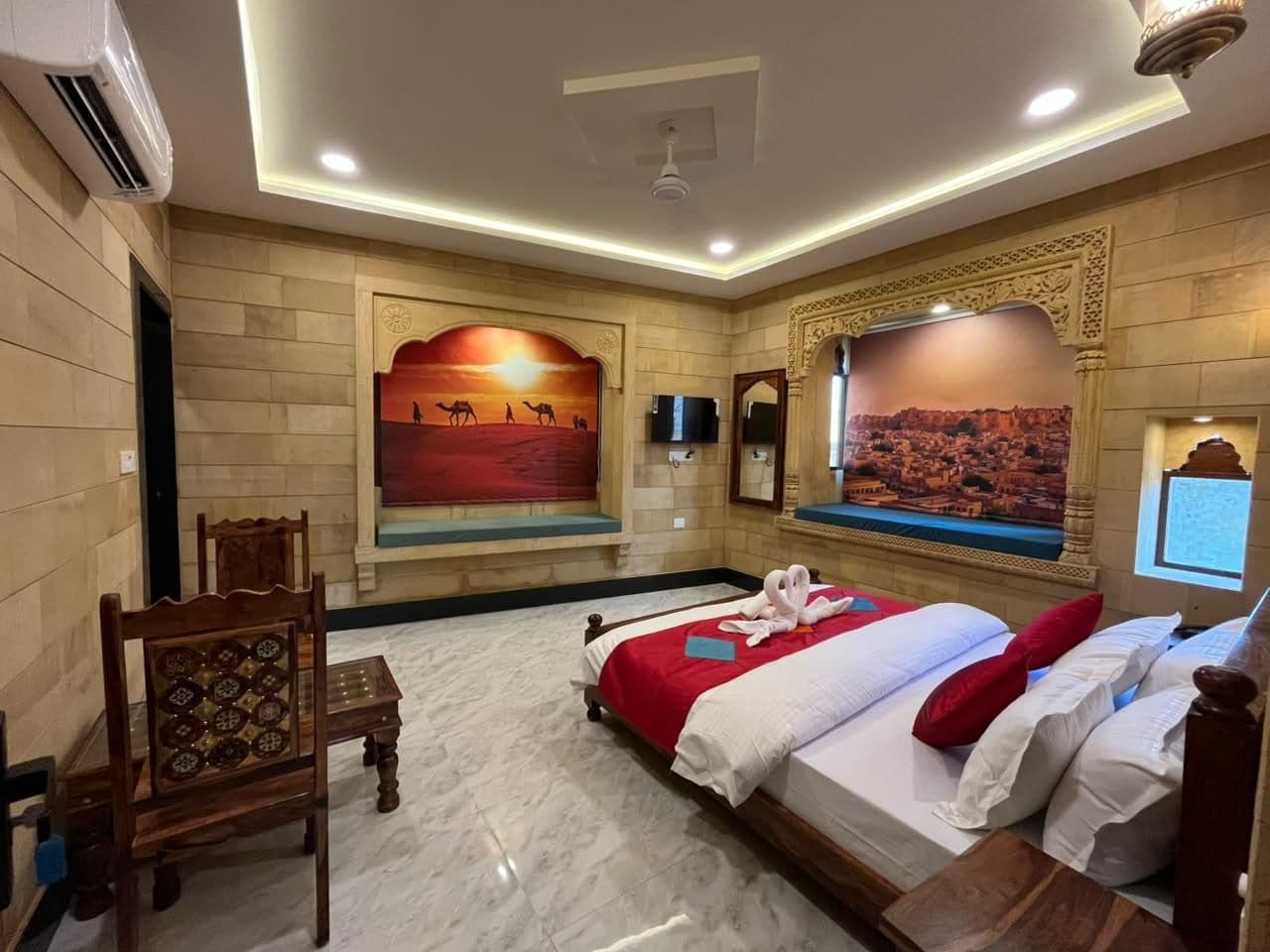 A hotel room with a bed, a chair, a wall-mounted TV, and a large window.