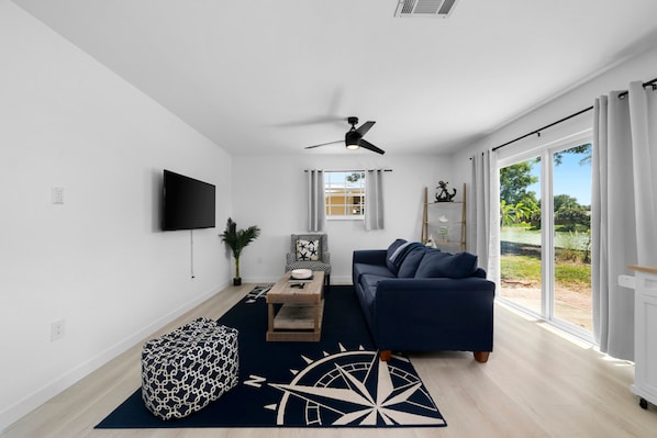Living area - Lake Patio + Firepit + Grill | Mins to Vanderbilt Beach | Fisherman's Cottage (Naples)
