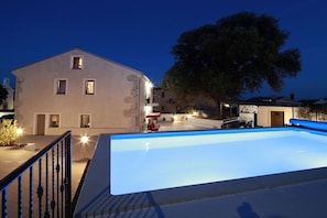 A building with a swimming pool, a staircase, and a tree. - Villa in Kornic, Krk with swimming pool (Kornic, Krk)