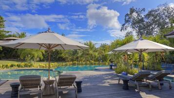 Outdoor pool, open 7:00 AM to 7:00 PM, pool umbrellas, sun loungers