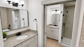 Shower, jetted tub, hair dryer, towels