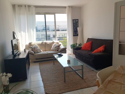 50-square-meter apartment · free parking · across from the Memorial
