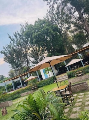 Outdoor dining - Cozy Studio with Private Terrace & Garden Views (Western Region)