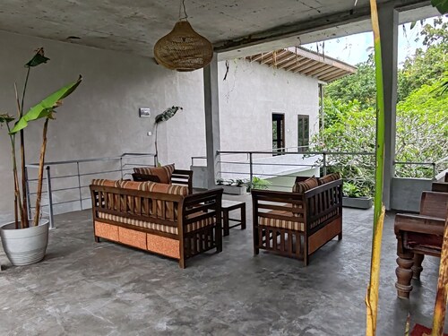Greeny surrounding and outdoor pool is a refreshing  - The gem in this area.