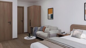 A hotel room with a bed, a sofa, a small table with books, and a wardrobe. - Sandoria Boutique Hotel (Phu Quoc)