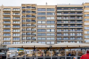A multi-story residential building with balconies and large windows. - Apartment in Blankenberge With Sea View (Blankenberge)