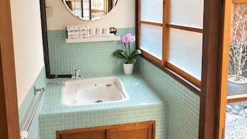 Hair dryer, bidet, towels, soap