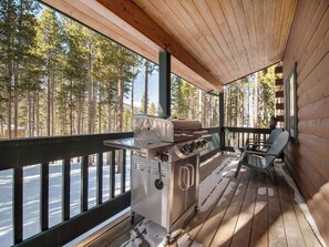 A covered outdoor area with a grill and seating. - Cabin w/ Hot Tub & Fireplace, Near Peak 7 Trails (Breckenridge)