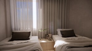 Twin Room, Private Bathroom | Desk, laptop workspace, blackout drapes, soundproofing - Hotel COTA (Busan)