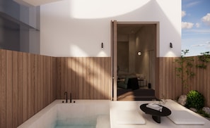 A modern outdoor bathroom with a hot tub, wooden paneling, and a view into the adjacent living area. - Hotel COTA (Busan)