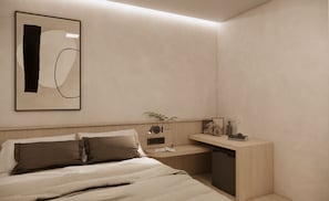 A modern bedroom with a bed, bedside table, and a desk with a chair. - Hotel COTA (Busan)
