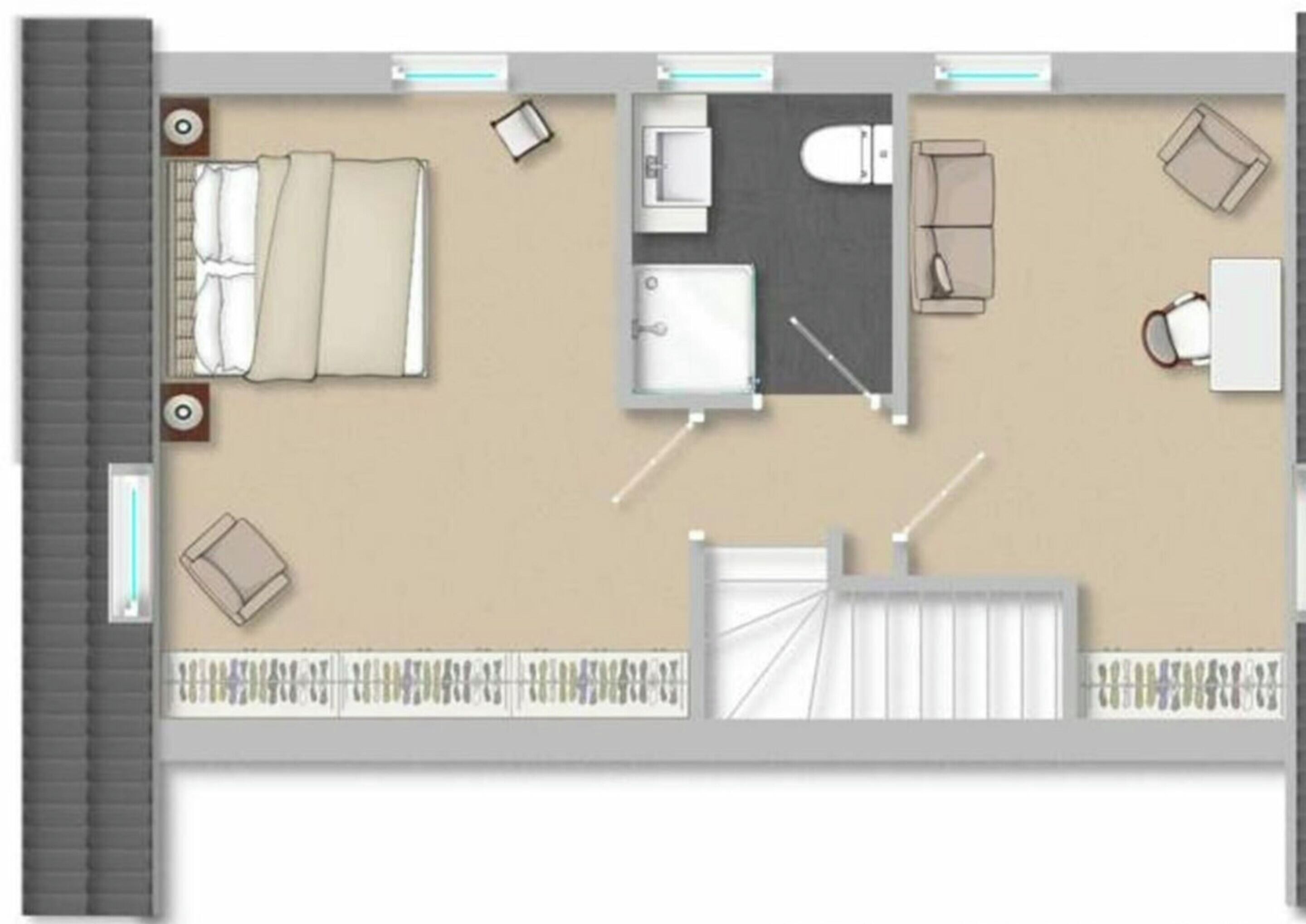 Un plan d’aménagement de chambre d’hôtel comprenant un lit, un bureau, une chaise, des toilettes et un espace douche.