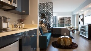 A modern kitchen with a microwave, a coffee machine, and a refrigerator. - Deluxe Studio in Coconut Grove-city & Bay Views...includes Parking (Miami)