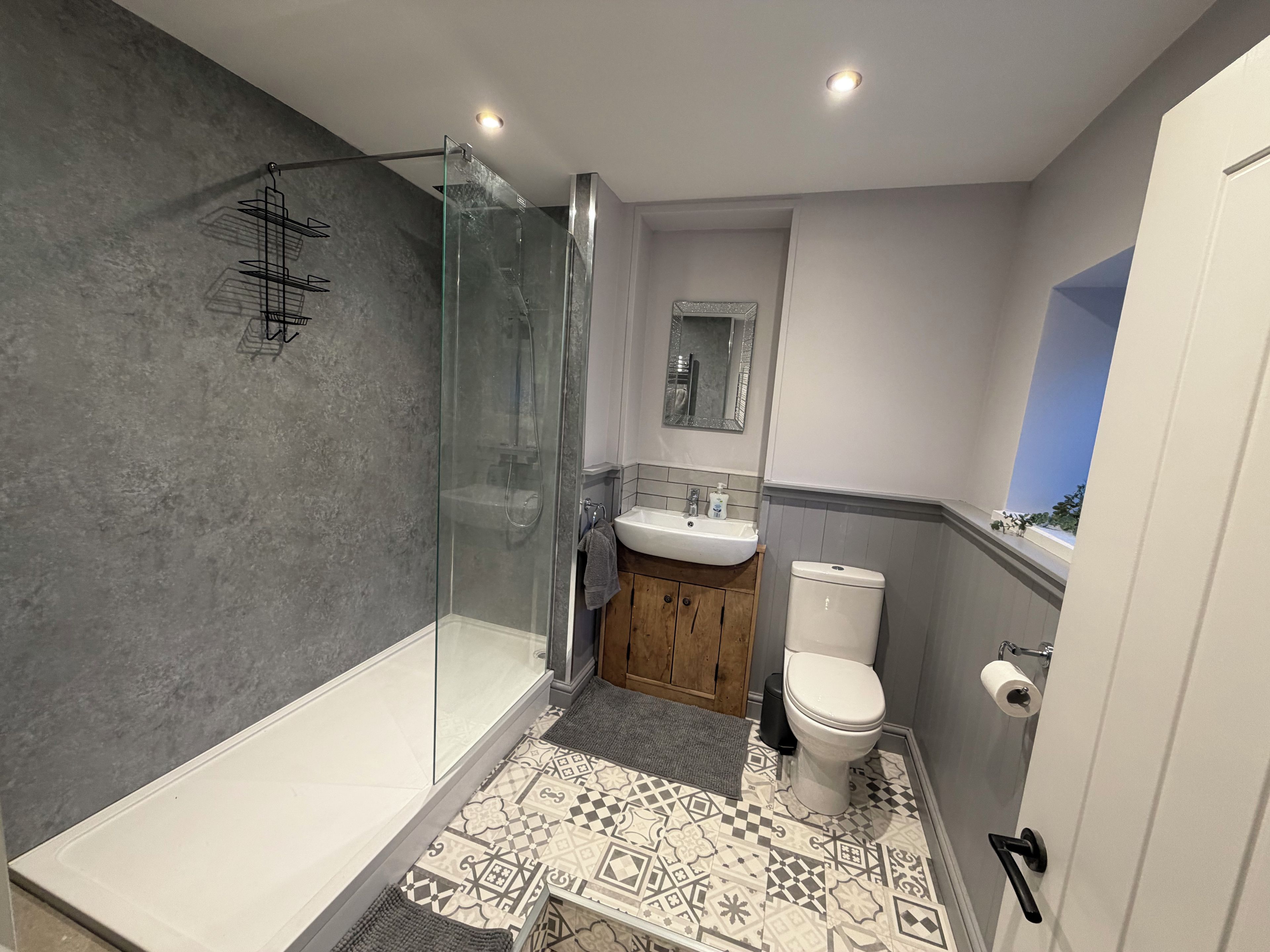 Shower, towels, soap, toilet paper