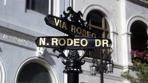 A street sign with 'VIA RODEO' and 'N. RODEO DR' indicating a street intersection. - Spacious 2BR Near Cedars-Sinai, Beverly Hills & The Grove (Beverly Hills)