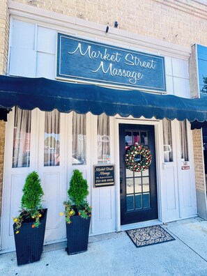 A storefront with a sign reading 'Market Street Massage' and a contact number. - Historic charm meets contemporary style-steps away from downtown and waterfront (Washington)