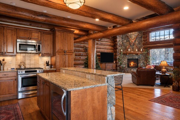 Living room flows into the kitchen - Moose Drool Lodge | Luxury Mountain Lodge | Private Hot Tub (Winter Park)