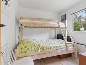 A bunk bed with a wooden ladder, a desk, and a chair. - "Ølvir" - 525m from the sea by Interhome (Nykøbing Sj)