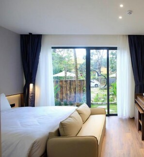 Phòng đôi Deluxe, quang cảnh sân vườn | Két bảo mật tại phòng, phòng cách âm, bàn ủi/dụng cụ ủi quần áo 