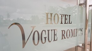 A glass facade with the words 'HOTEL VOGUE ROMA' indicating the hotel's name. - Vogue Rompin (Kuala Rompin)