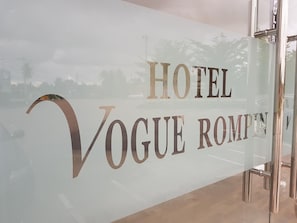 A glass facade with the words 'HOTEL VOGUE ROMA' indicating the hotel's name. - Vogue Rompin (Kuala Rompin)