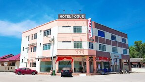 A multi-story hotel with a prominent sign reading 'HOTEL VOGUE HOTEL ROMANIN'. - Vogue Rompin (Kuala Rompin)