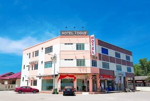 A multi-story hotel with a prominent sign reading 'HOTEL VOGUE HOTEL ROMANIN'. - Vogue Rompin (Kuala Rompin)