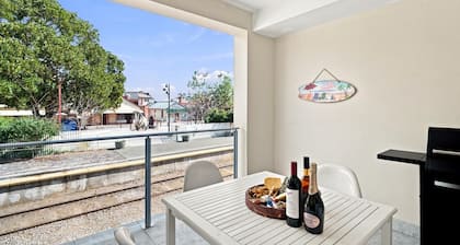 Modern 2BR Townhouse | Coastal Views, Double Garage & Steps to the Beach