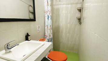 Shower, towels, soap, toilet paper