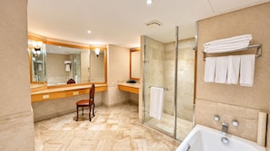 A modern bathroom with a glass-enclosed shower, a large mirror, and a bathtub. - BERI HOTEL Kaohsiung (Kaohsiung City)