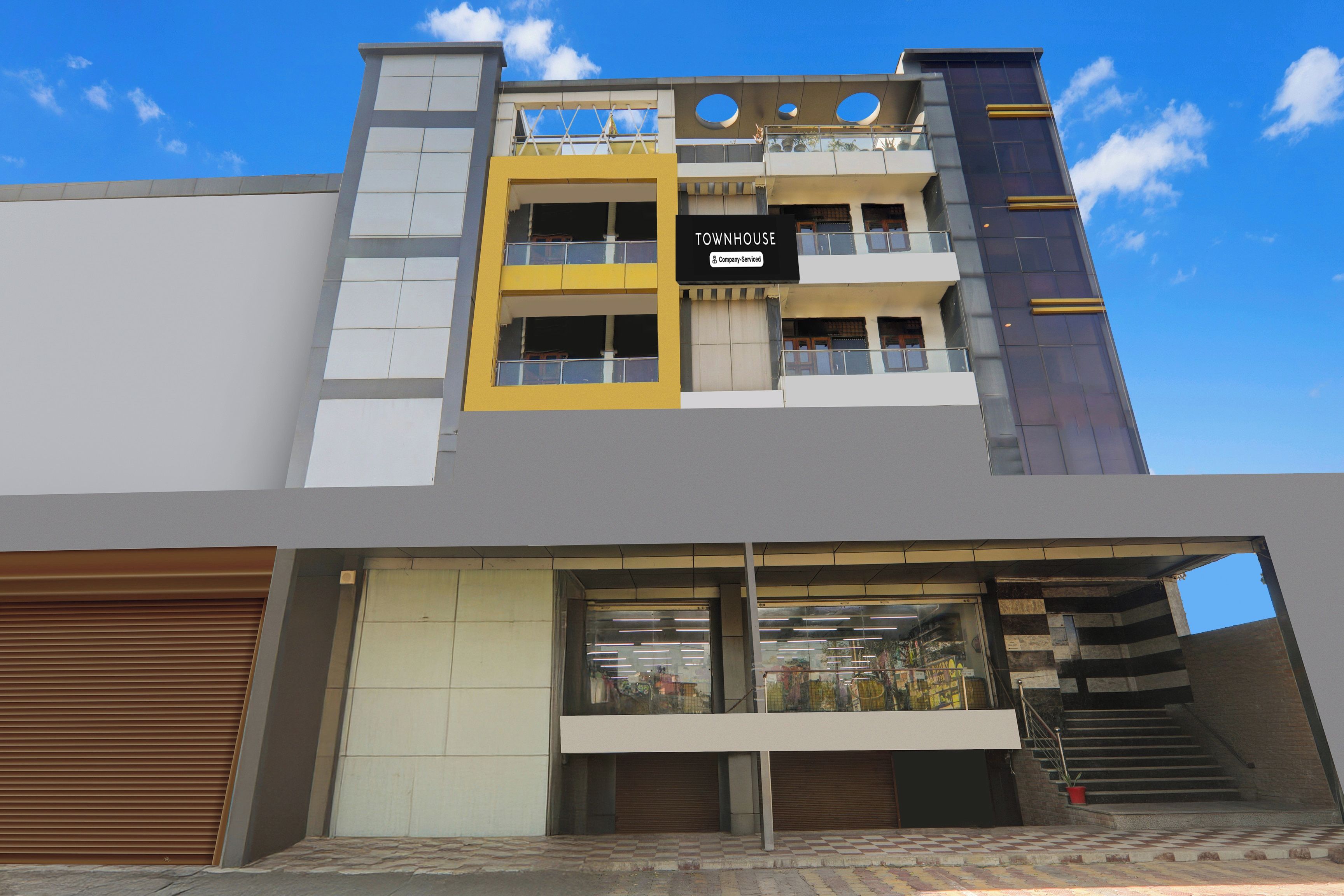 A multi-story building with a storefront at the ground level.