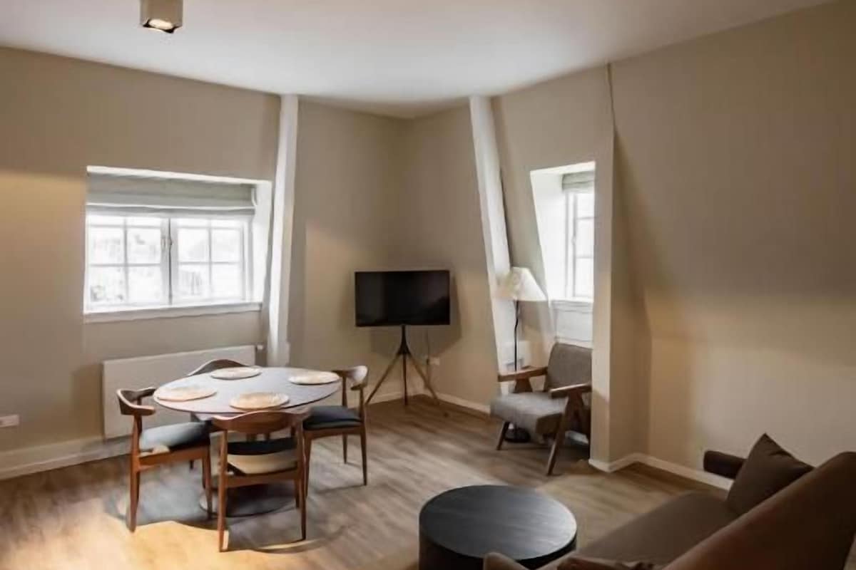 Studio – deluxe, byutsikt | Oppholdsområde