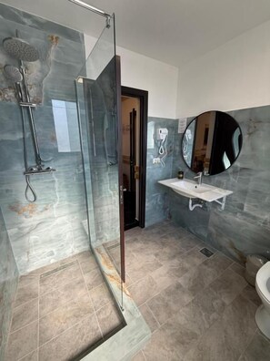 Shower, free toiletries, hair dryer, towels