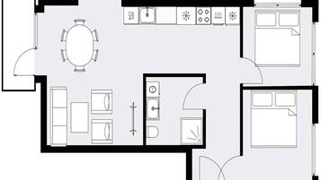 Een plattegrond met een keuken, een eetruimte en twee slaapkamers.