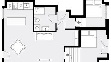 A floor plan with a kitchen, dining area, and two bedrooms.