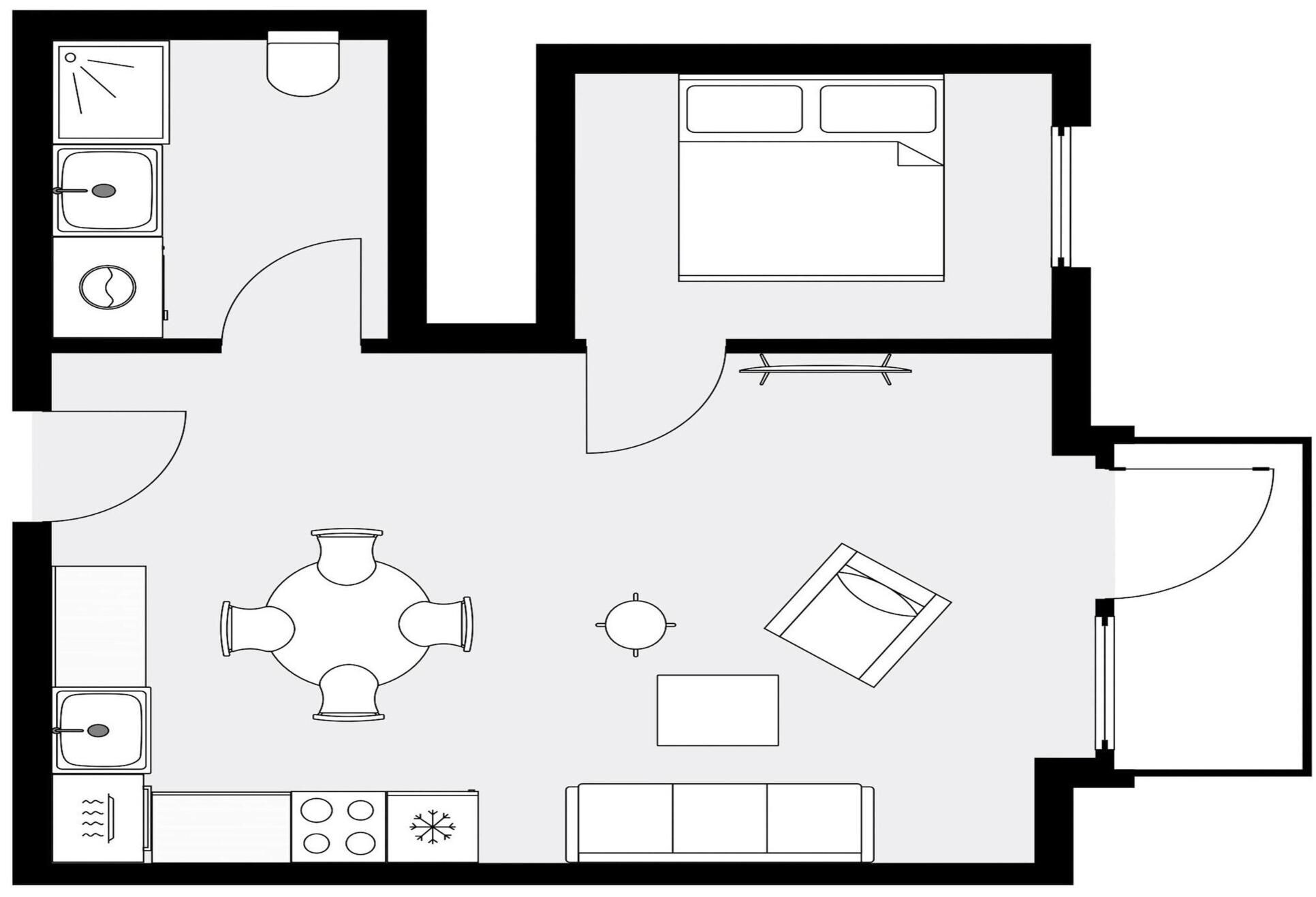 A floor plan with a kitchen, dining area, and a living room.