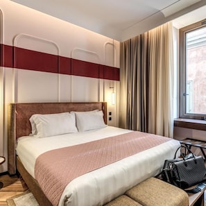 A hotel room with a large bed, a bedside table, a lamp, and a window with curtains. - THE Steps Hotel by Eitch Collection (Rome)