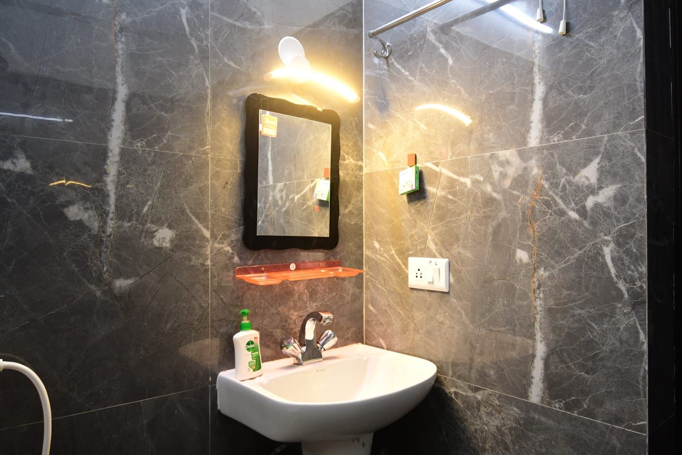 Rainfall showerhead, designer toiletries, heated floors (bathroom)
