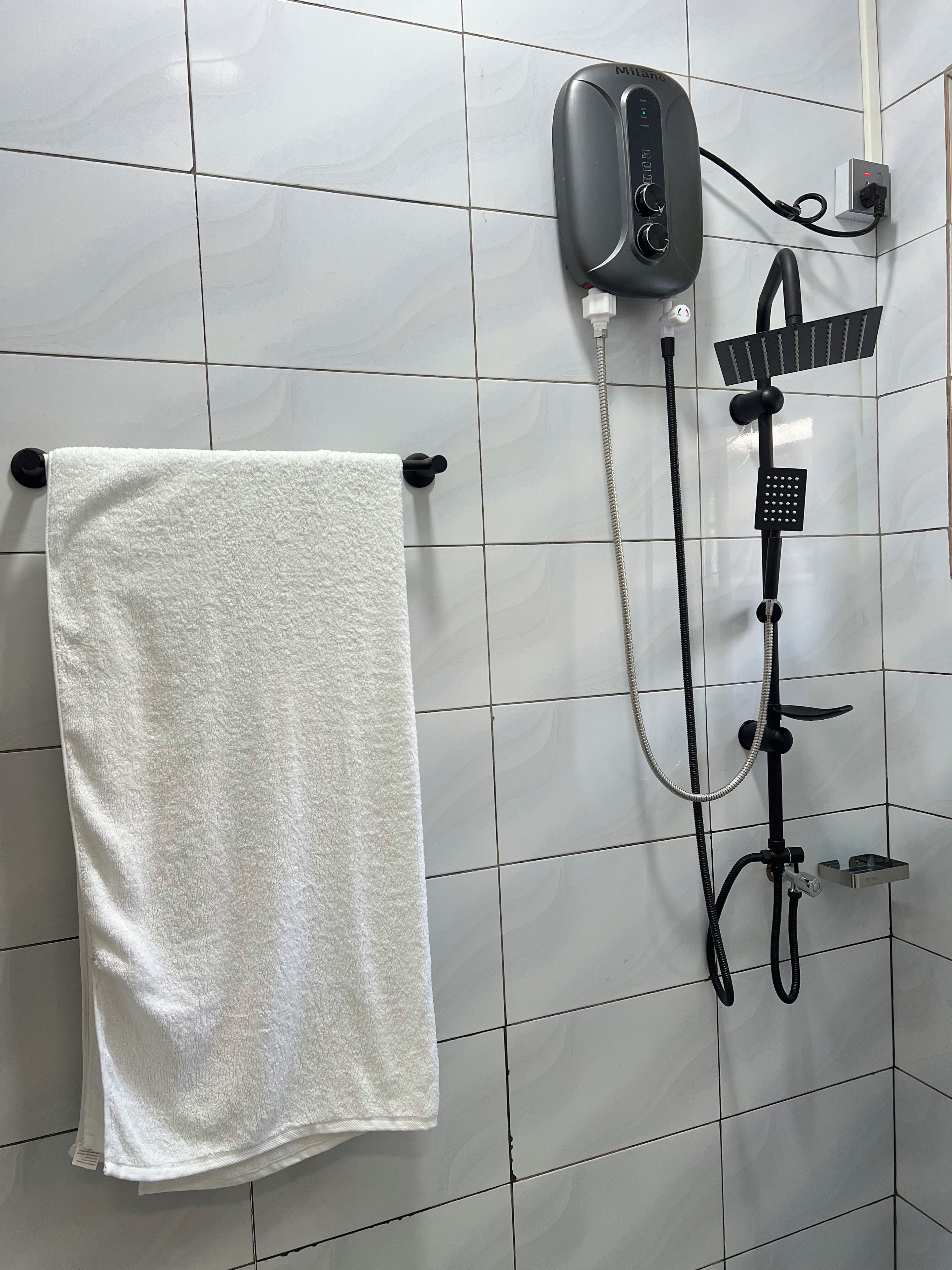Basic Apartment, Patio | Bathroom | Shower, slippers, towels, soap